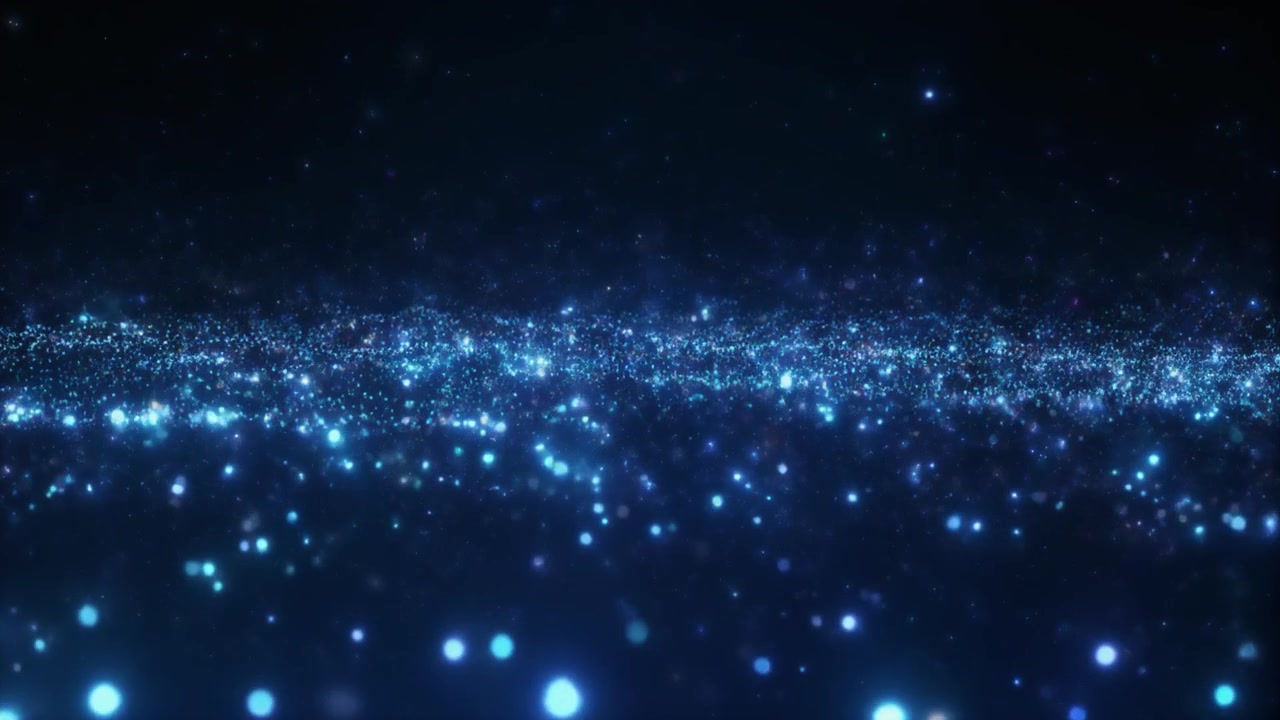 抽象背景：發光藍色粒子漂浮在黑暗空間中
