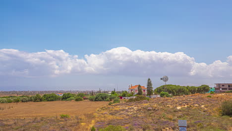 timelapse of cumulonimbus forming over the skies of cyprus landscape with blue mediterranean skies