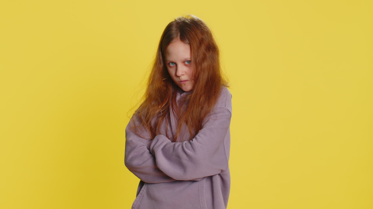 Offended child girl having misunderstanding frustrated after quarrel ignores communication talk