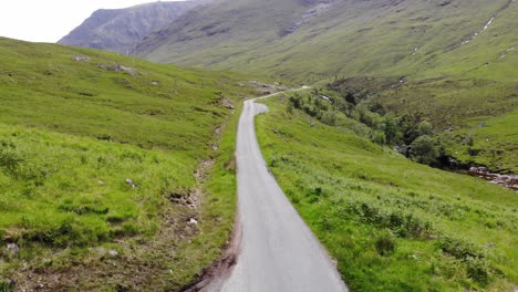 static drone footage on unnamed road alongside river etive in ballachulish, scotland. ungraded - recorded june 2019