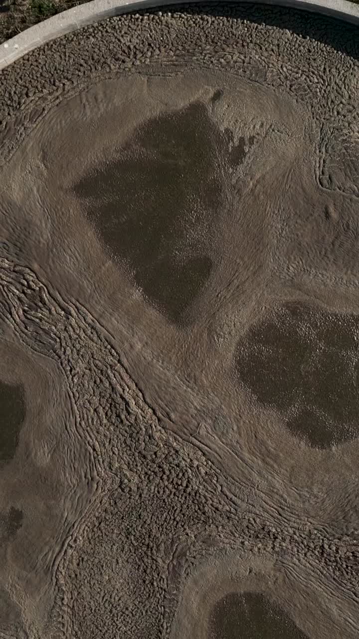 Aerial view of wastewater treatment plant tanks