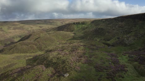 aerial clip showing moorland vegetation on a steep and bumpy hillside in the north york moors