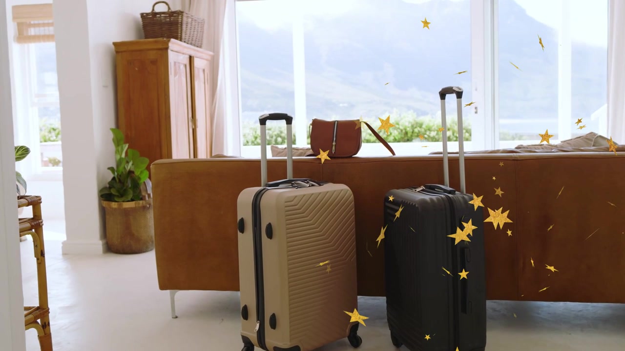 Dopo il primo fotogramma, coriandoli dorati che fluttuano attraverso il soggiorno, passando valigie e aggiungendo allegria da viaggio