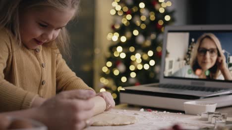 Video-of-girl-baking-and-chatting-with-grandma-via-laptop