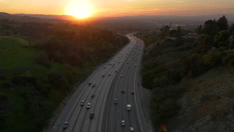 aerial view of highway traffic at sunset