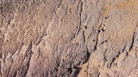 bird's eye view of thin sheets of eroded rocks on dry northside of curacao