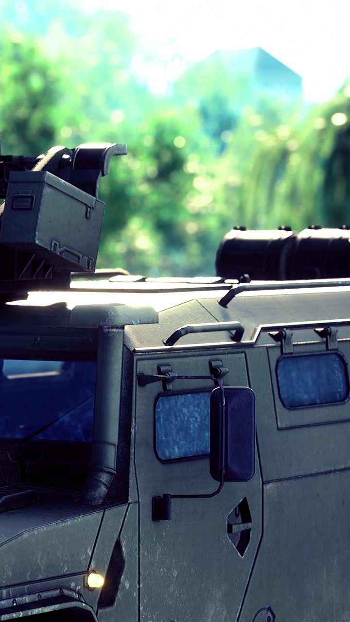 Military vehicle equipped with equipment in outdoor location near trees