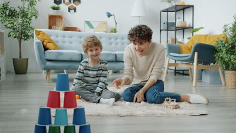 mother and child playing in living room