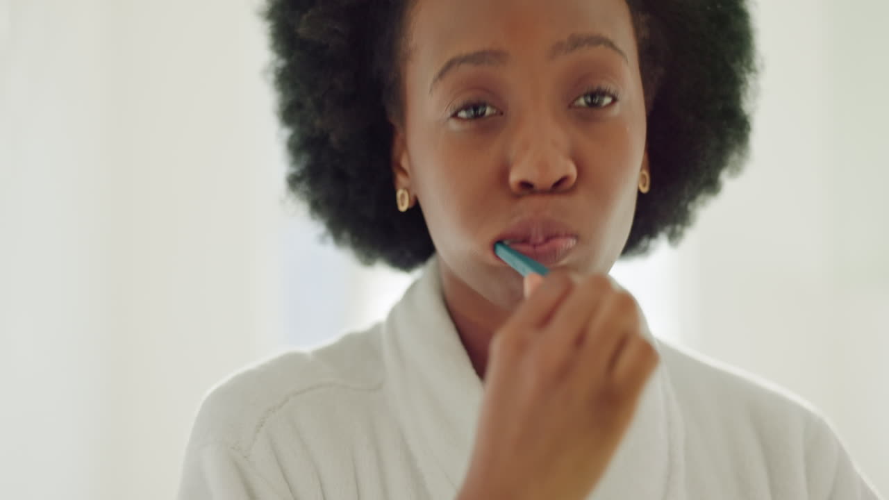Dental, health and black woman brushing teeth