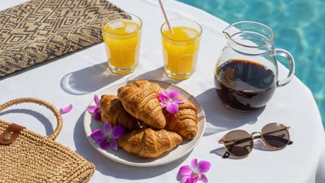 a relaxing brunch scene by the pool featuring fresh croissants, tropical drinks, and stylish sunglasses with beautiful orchids for a perfect summer vibe