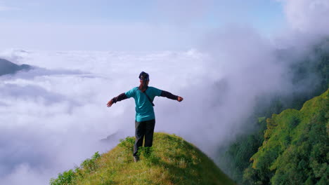 Rotating-drone-shot-of-sunny-morning-above-green-hills-of-Nepal