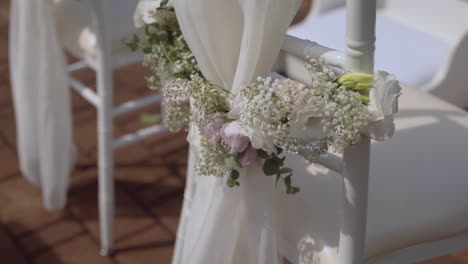 close-up of wedding rings on glass table