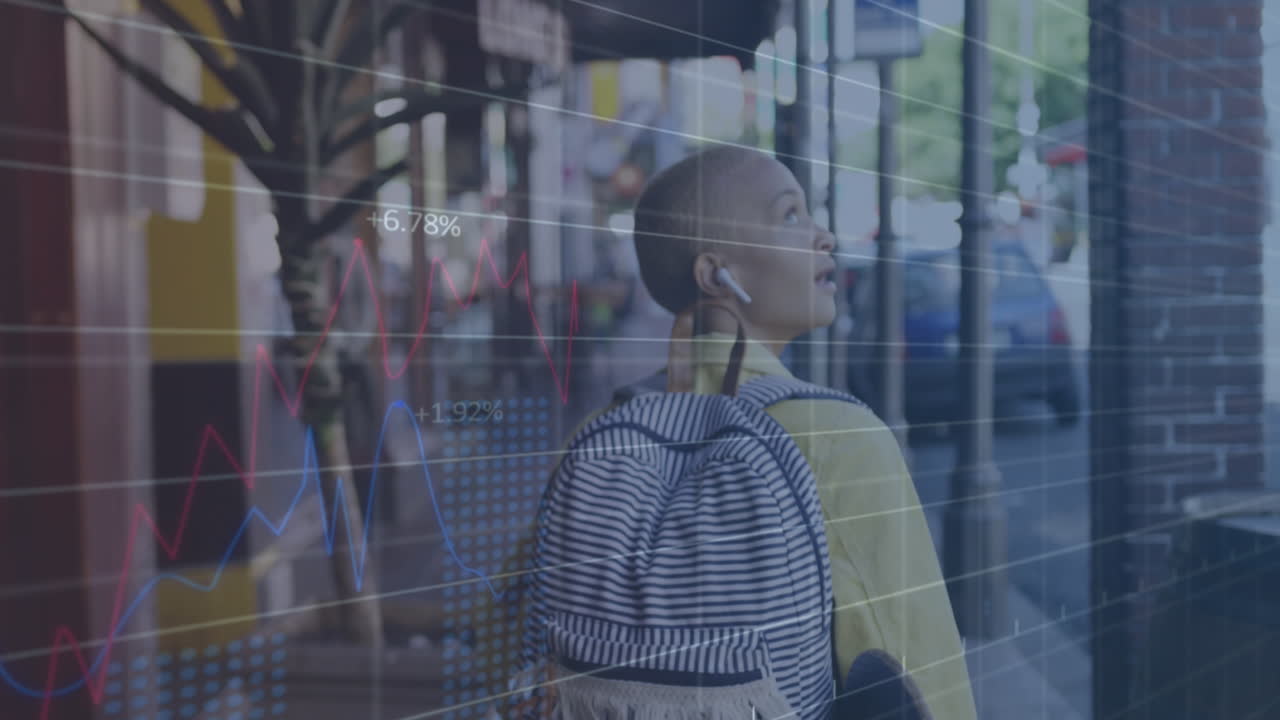 Animation of statistical data processing over biracial woman with skateboard walking on the street