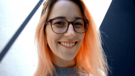 woman with spectacles smiling 4k