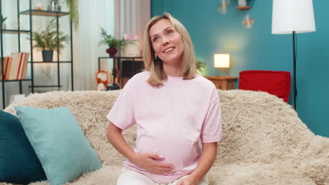 pregnant woman counting euro cash money planning budget for childbirth calm financial security