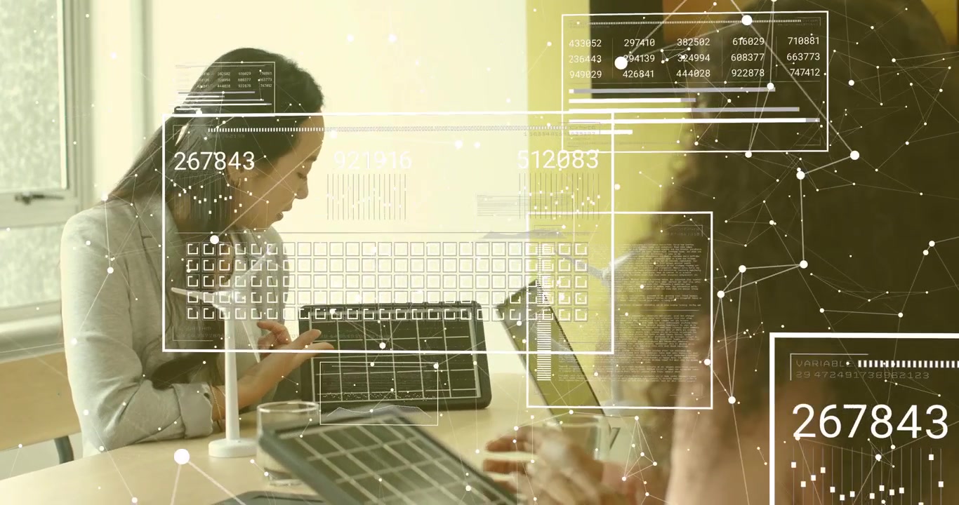 Engineer tapping laptop in tech meeting, summoning data grid around solar panel, presenting metrics