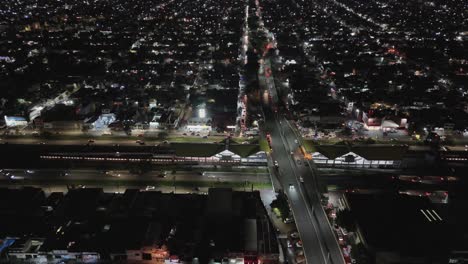 aerial night views of a vehicles avenue in ecatepec, mexico city suburbs