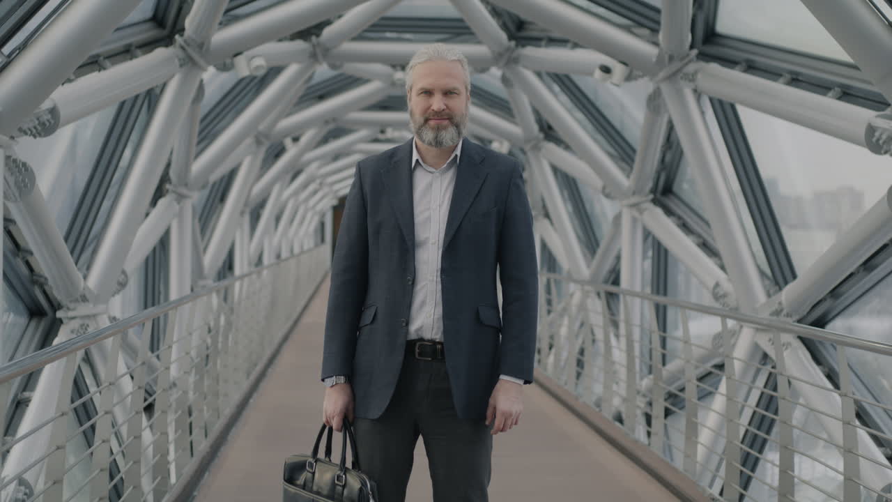 Businessman Walking on Modern Pedestrian Bridge