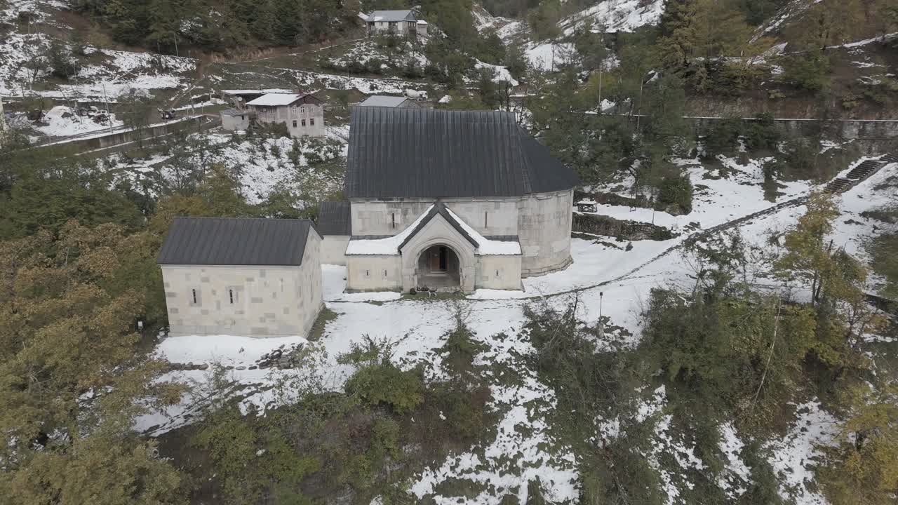 Cinematic daytime drone footage of a church in Ajaria, Georgia.