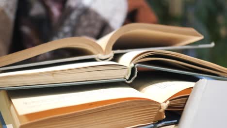 stack of open books