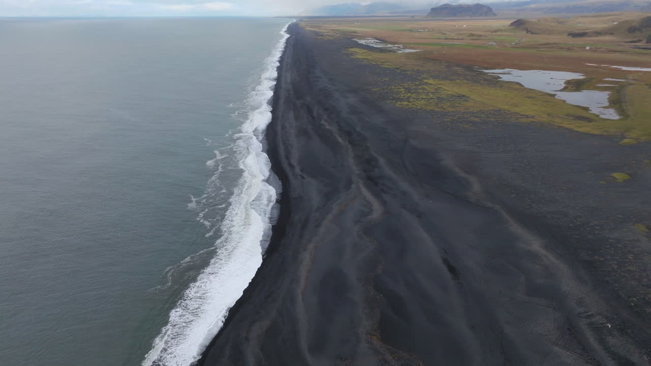 Long Black Sand Beach In Dyrh&oacute;laey Peninsula, Southern Coast Of Iceland