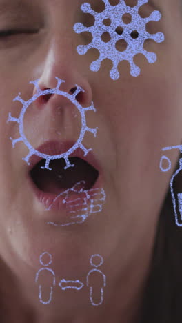animación de iconos de la pandemia sobre una mujer caucásica estornudando