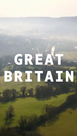 vertical video aerial drone shot of fields and countryside in uk with animated graphic spelling out great britain