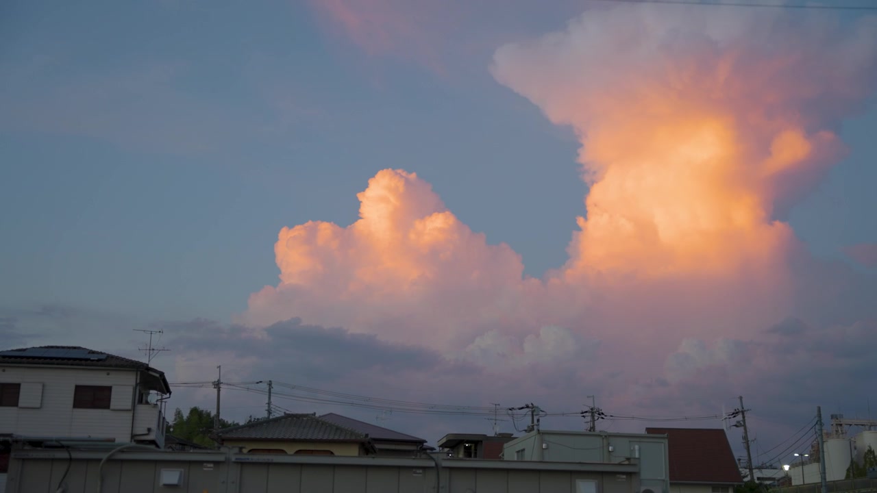 Warm Rising Cumulus Clouds, Vibrant Orange in Summer Japan Sky