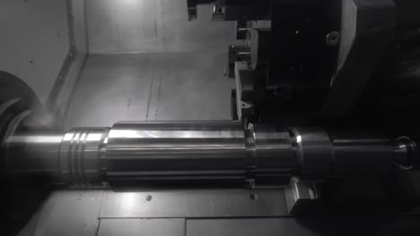 Metalworking-CNC-lathe-milling-machine.-Cutting-metal-modern-processing-technology.