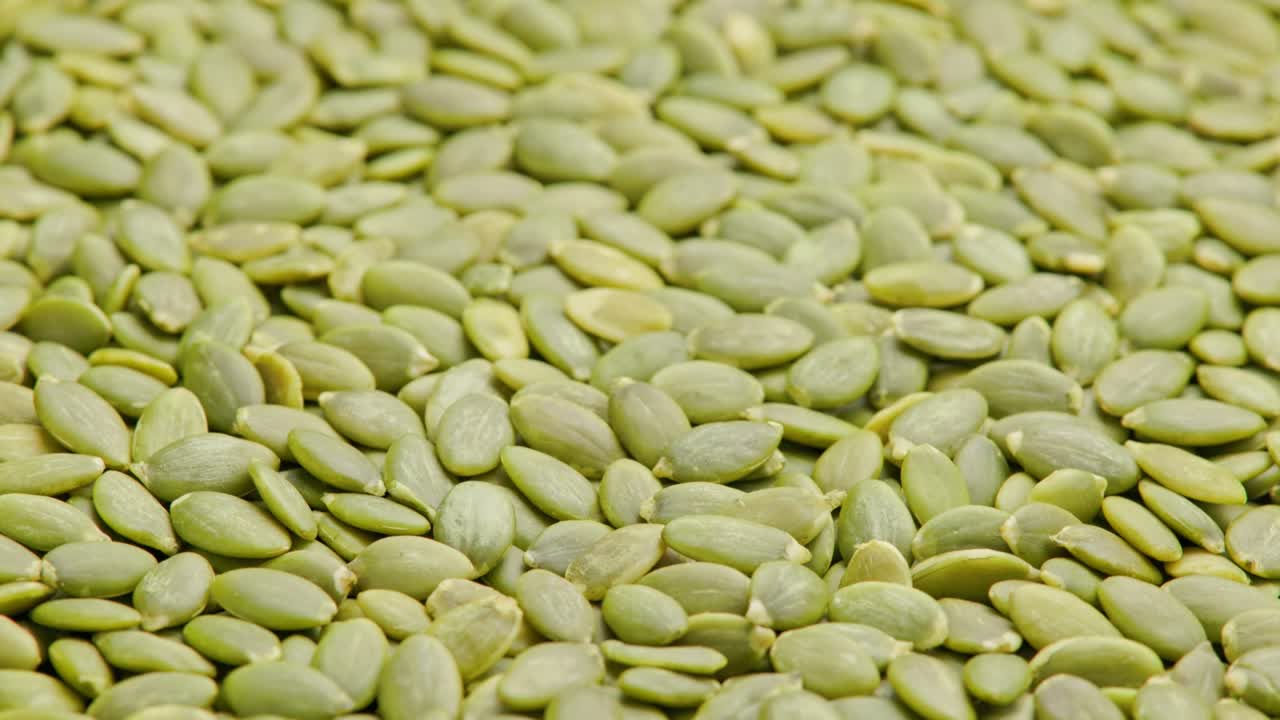 semillas de calabaza descascaradas fondo giratorio de marco completo