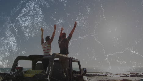 two men standing open-top jeep raising arms at ocean edge with animated travel icons and charts