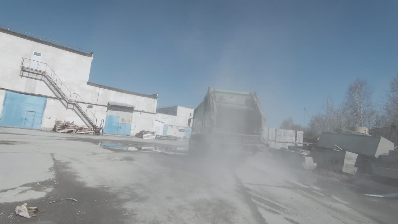 Garbage Truck at a Construction Site