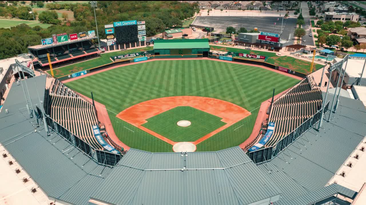 Aerial Hyperlapse of Round Rock Express Dell Diamond Baseball Stadium Push in on sunny summer Texas day with 4k drone