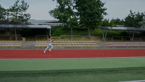 woman running on a track