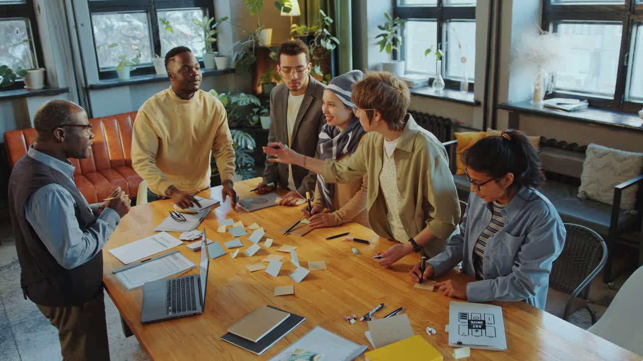 Group of Students Using Adhesive Notes and Talking on Language Class