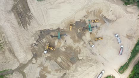 aerial view loading bulldozer in open air quarry