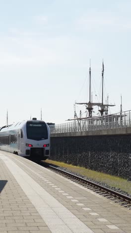 train at a station by the harbor in leeuwarden, netherlands