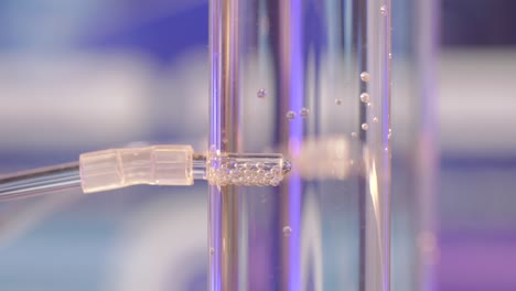close-up of bubbles in a glass tube