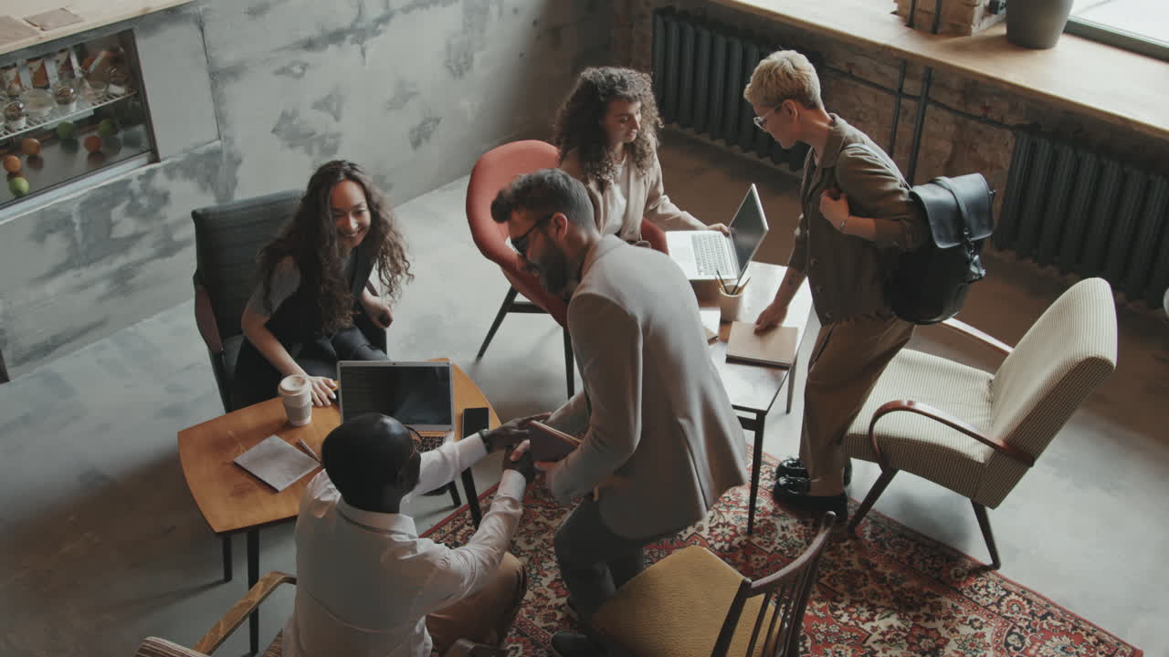 Top-View of Young Business People Meeting for Coworking