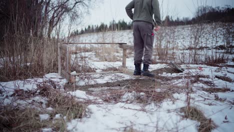 Man-Building-DIY-Hot-Tub-Made-Of-Wood-Outdoor-In-Winter