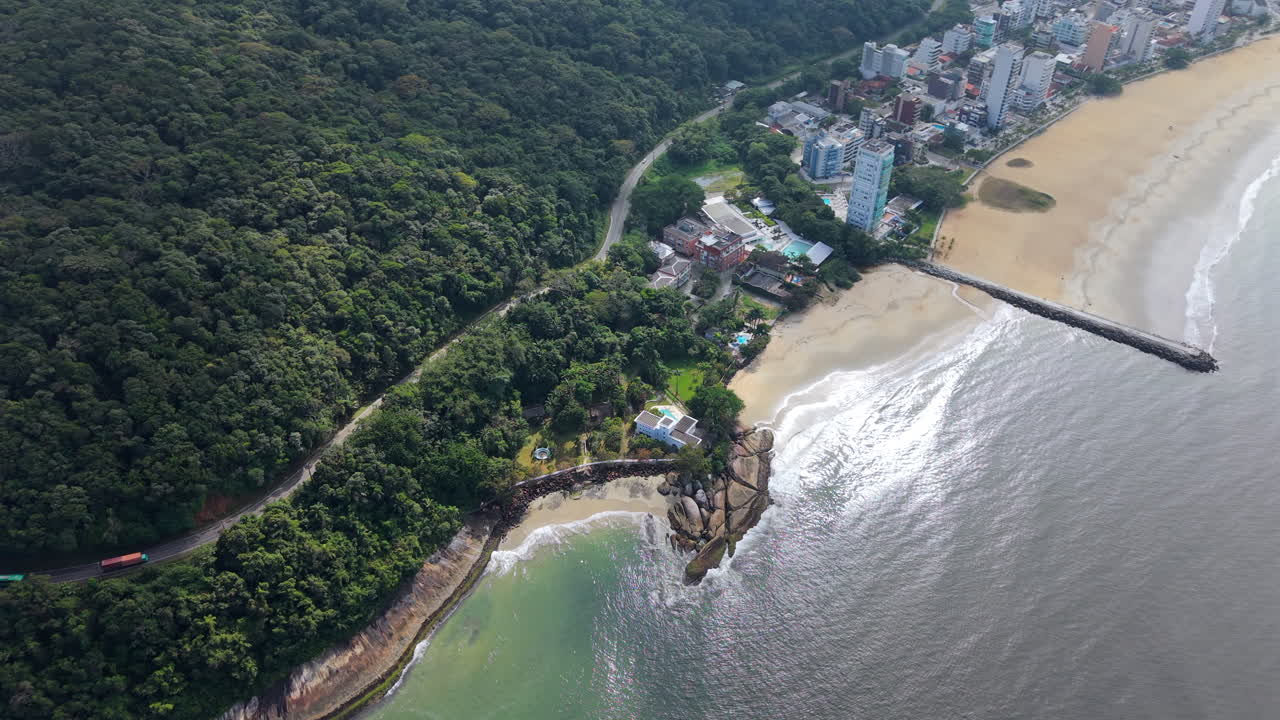 Aerial View of Coastline, City, and Forest