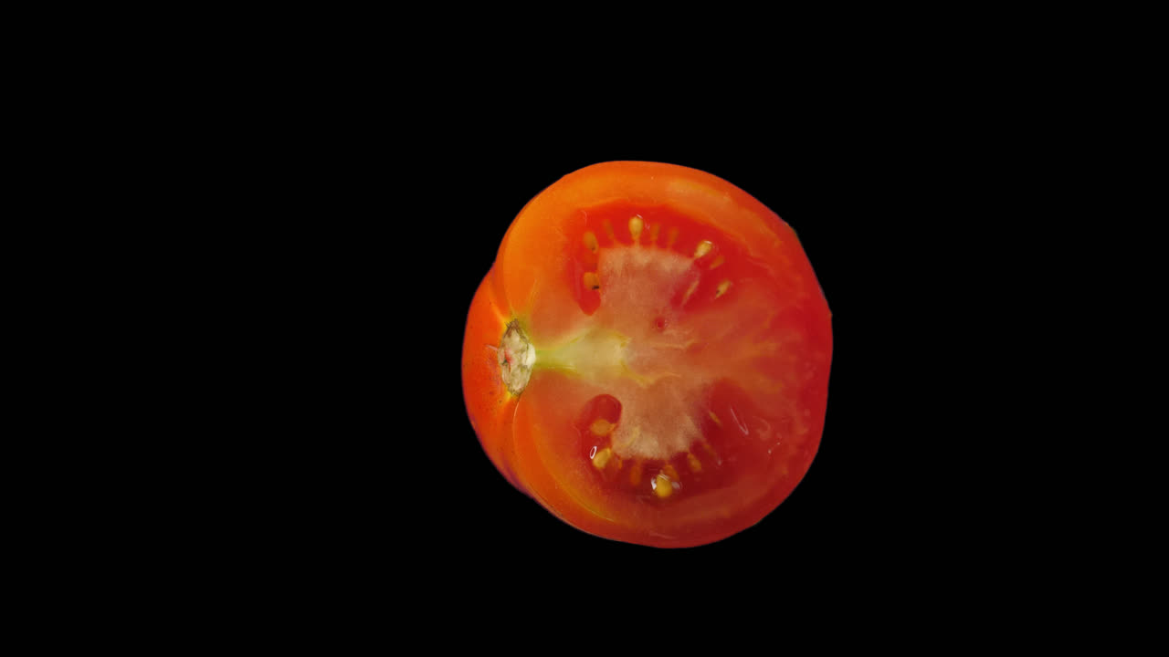 Slice Of Tomato Rotating With Alpha Channel, Video In 4K