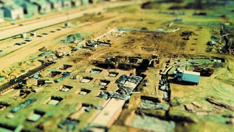 Large-construction-site-with-heavy-equipment-and-people-at-work---aerial-time-lapse-tilt-shift-effect