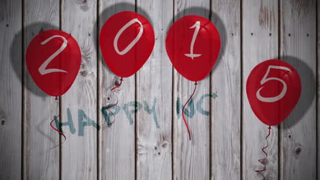 2015 balloons against wooden planks