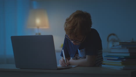 child studying late at night