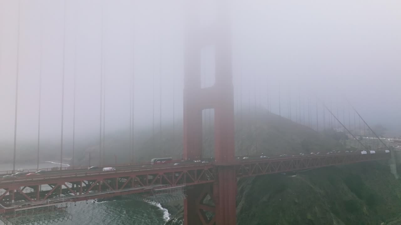 Aerial of the Golden Gate Bridge in San Francisco in a misty day