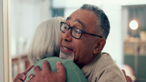 Love,-hug-and-a-senior-couple-in-their-home