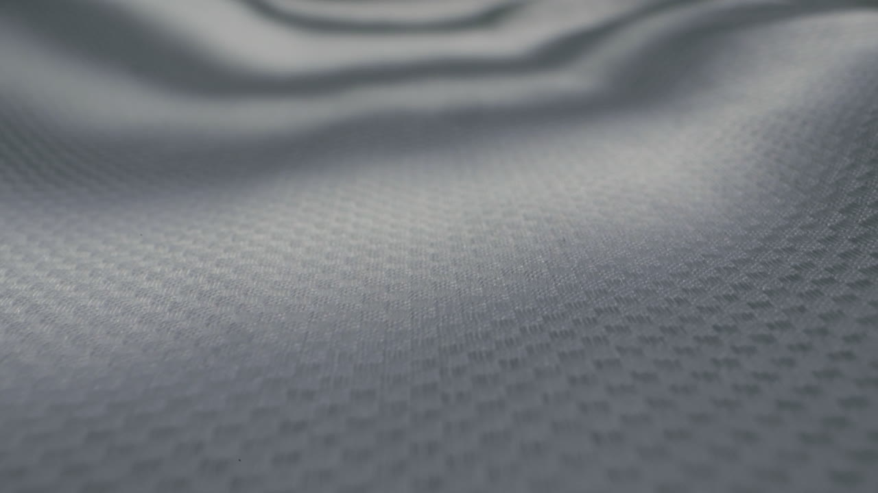 Closeup of an expertly tailored suit that beautifully showcases its sophisticated buttons and fine fabric texture