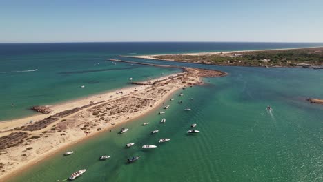 boats in tropical sand beach aerial view