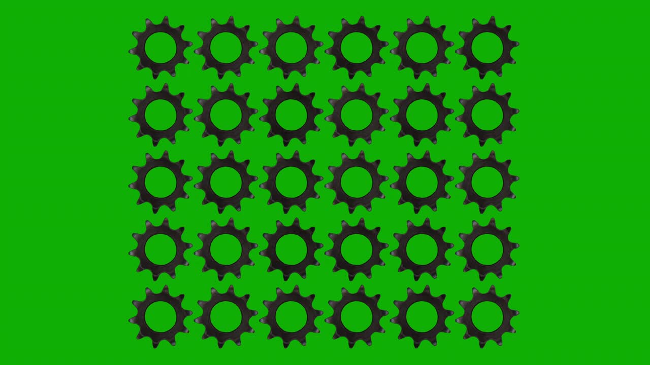 Gráficos em movimento de padrão de engrenagens giratórias com fundo de tela verde.